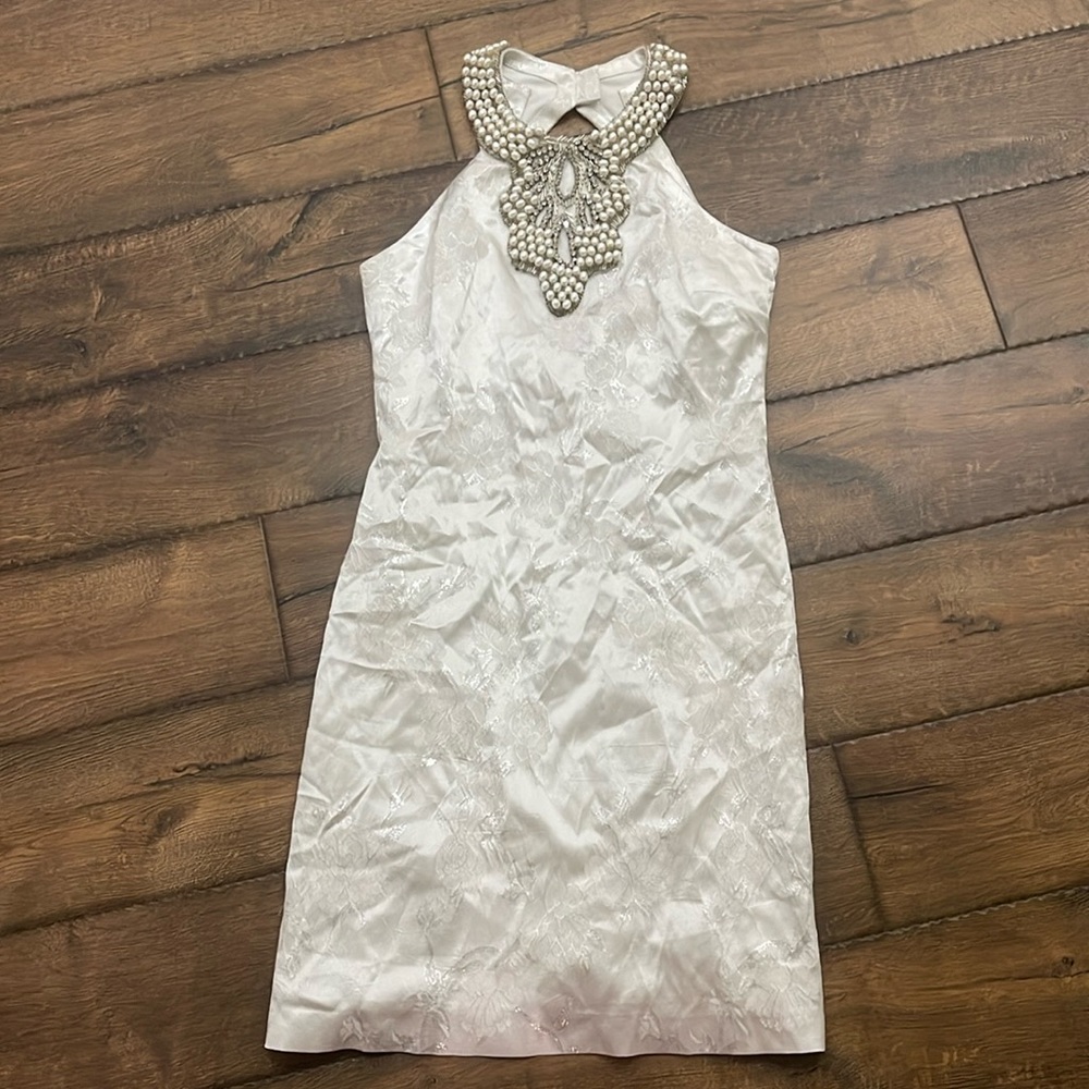 Women’s Cache short white silver dress with bead neckline size 6 never worn.